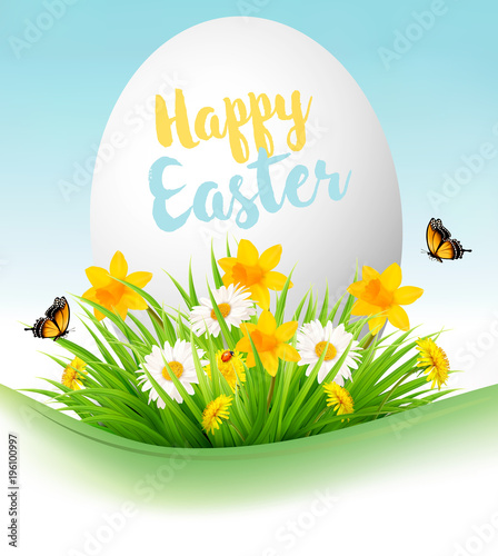 Easter Holiday Background. Colofrul eggs in green grass and flowers. Vector..