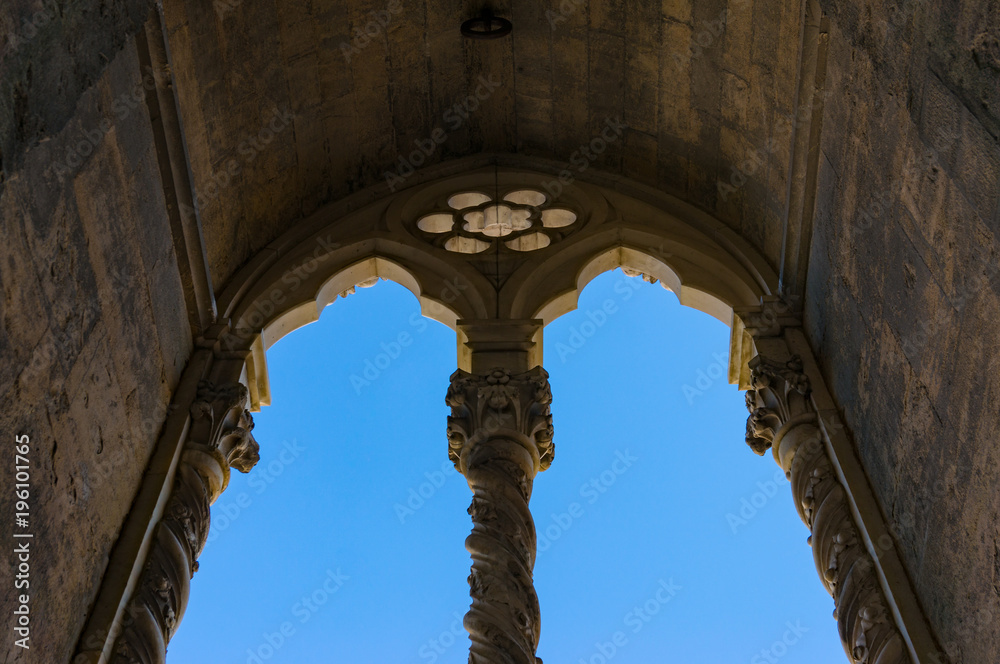 Blue sky seen through gothic style window