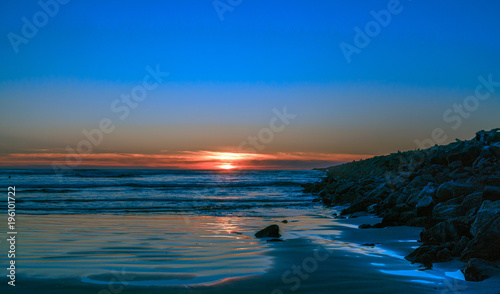 Ocean Sunset Along The Jetty © John