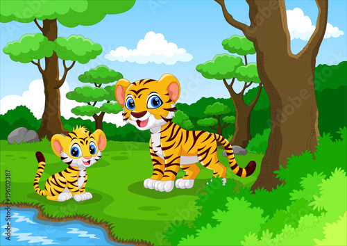 Tiger cartoon in the forest with his cute son