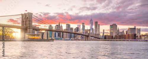 Beautiful sunset over brooklyn bridge in New York City photo