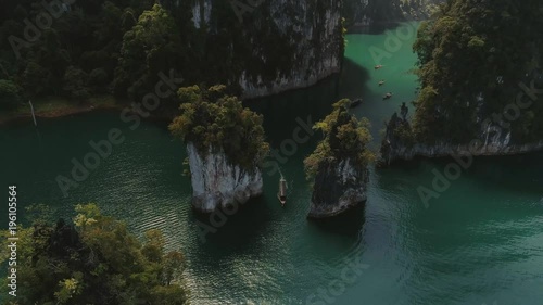 Tropical Thai jungle lake Cheo lan drone flight, wild mountains nature national park
