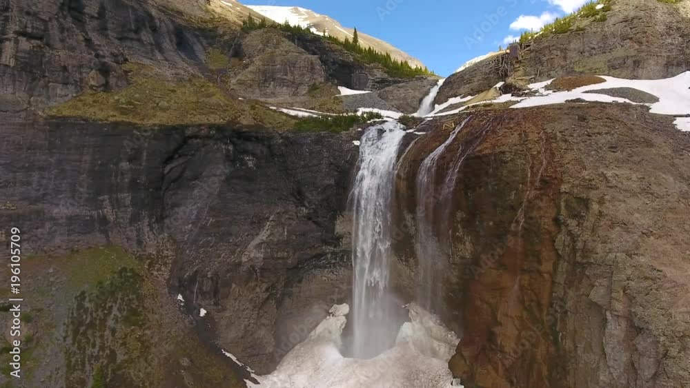 Flyover Epic Snowy Waterfall and Mountain Cliffs Flyover Epic Snowy Waterfall and Mountain Cliffs