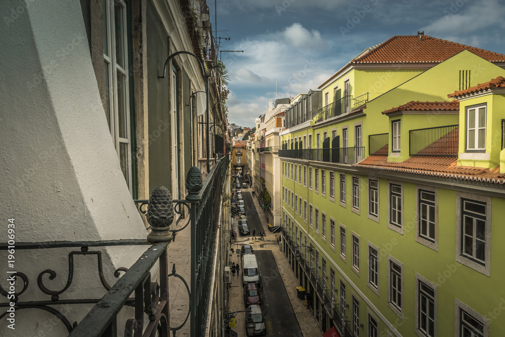 LISBON / PORTUGAL - FEBRUARY 17 2018: VIEW FROM BALCONY AT OLD CITY OF LISBON LISBON / PORTUGAL - FEBRUARY 17 2018: VIEW FROM BALCONY AT OLD CITY OF LISBON