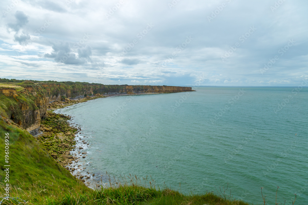 WWII, The Pointe du Hoc was the highest point between Utah Beach and Omaha Beach. On D-Day the US Army assaulted and captured Pointe du Hoc after scaling the cliffs.