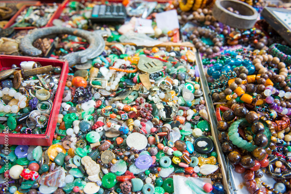 Fototapeta premium Traditional Chinese stone amulets made of jade at Upper Lascar Row historical market