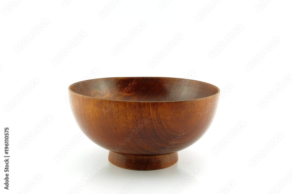 Wooden dishes bowls isolated on white background. Wooden dishes bowls isolated on white background.