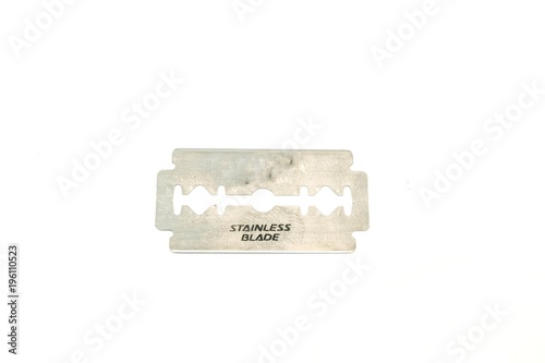 razor blade isolated on white background. Made of stainless steel does not rust.