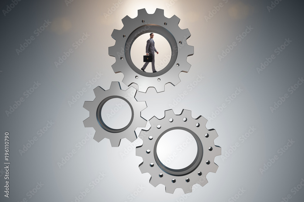 Teamwork concept with cogwheels and business people Teamwork concept with cogwheels and business people
