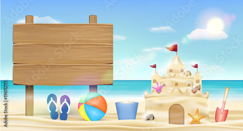 wood board sign on sea sand beach with sand castle