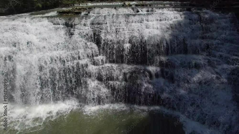 Reveal Large Cascading Waterfall. Reveal Large Cascading Waterfall.