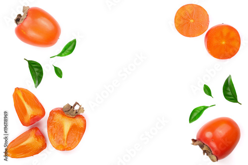 persimmon decorated with leaves isolated on white background with copy space for your text. Top view. Flat lay pattern