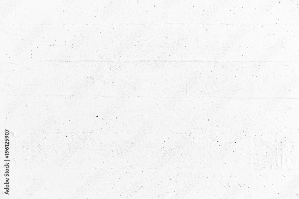 Fototapeta premium White ragged, rough wall concrete background.