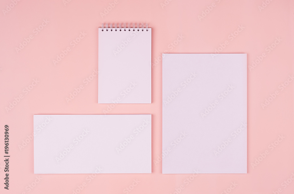 Blank white stationery collection on elegant soft pastel pink background. Corporate identity template. Mock up for branding, graphic designers presentations and portfolios. Top view.
