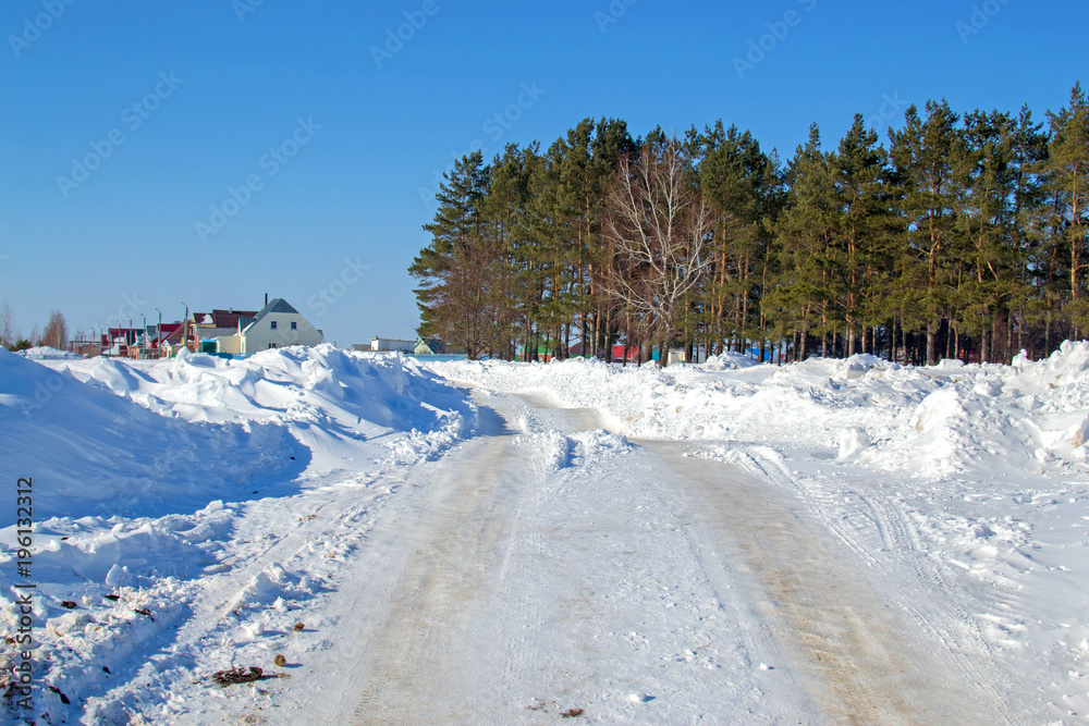 snow-cleared road to the village