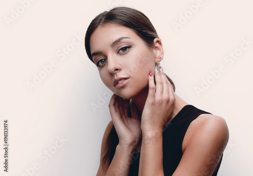 Portrait of a cute young woman with soft make-up