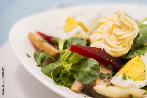 Potato salad with red beet, smoked herring, egg and soy-bean mayonnaise