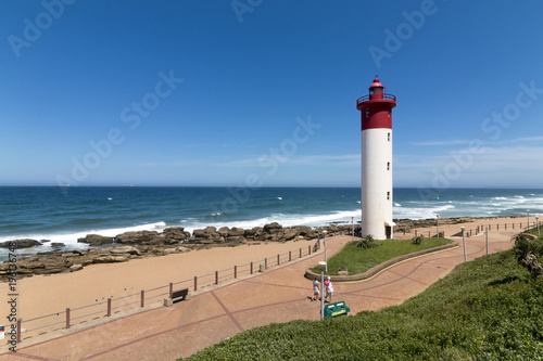  Lighthouse Against Blue Cloudy Coastal Seascape in South Africa