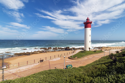  Lighthouse Against Blue Cloudy Coastal Seascape in South Africa