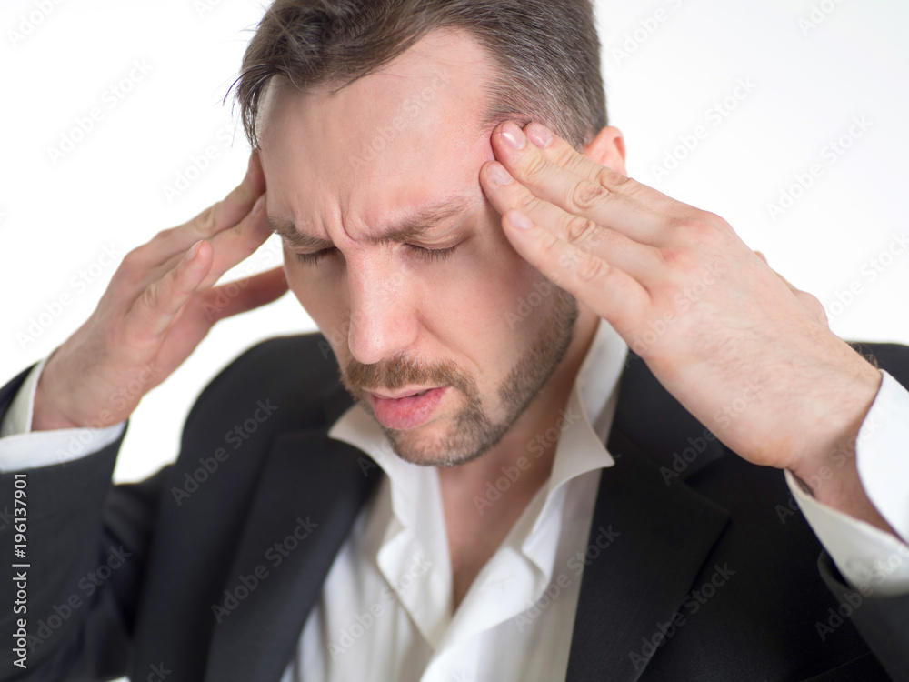 Head is blasting, strong migraine. Struggling handsome man with strong pain grimace. Head is blasting, strong migraine. Struggling handsome man with strong pain grimace.
