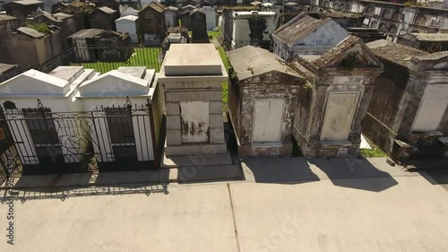 Soaring Low Over Tombs in Old And Urban New Orleans Cemetery