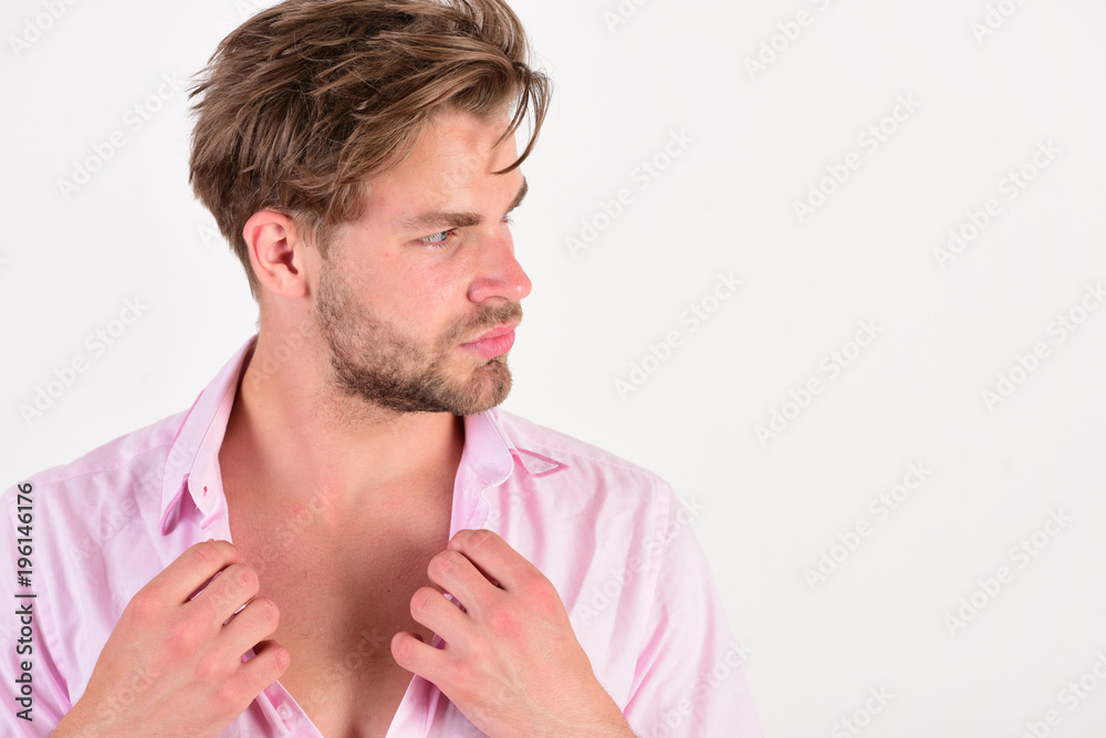 Obraz premium Guy with bristle in pink shirt and messy hair