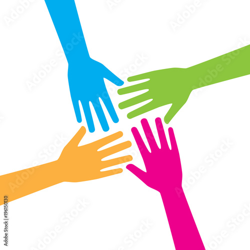 Four hands reaching out together making teamwork, partnership, friendship and unity