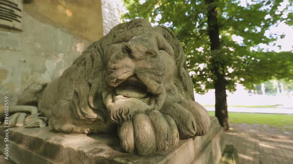 Marble lion sculpture at building entrance, Lviv city power symbol, decoration Marble lion sculpture at building entrance, Lviv city power symbol, decoration