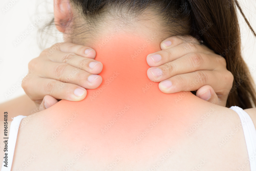 Closeup woman neck and shoulder pain and injury. Health care and medical concept. Closeup woman neck and shoulder pain and injury. Health care and medical concept.