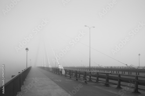 Fototapeta Naklejka Na Ścianę i Meble -  Bridge in the fog in Warsaw, Poland