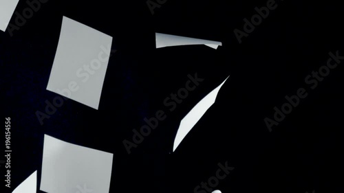 Blank paper sheets falling down