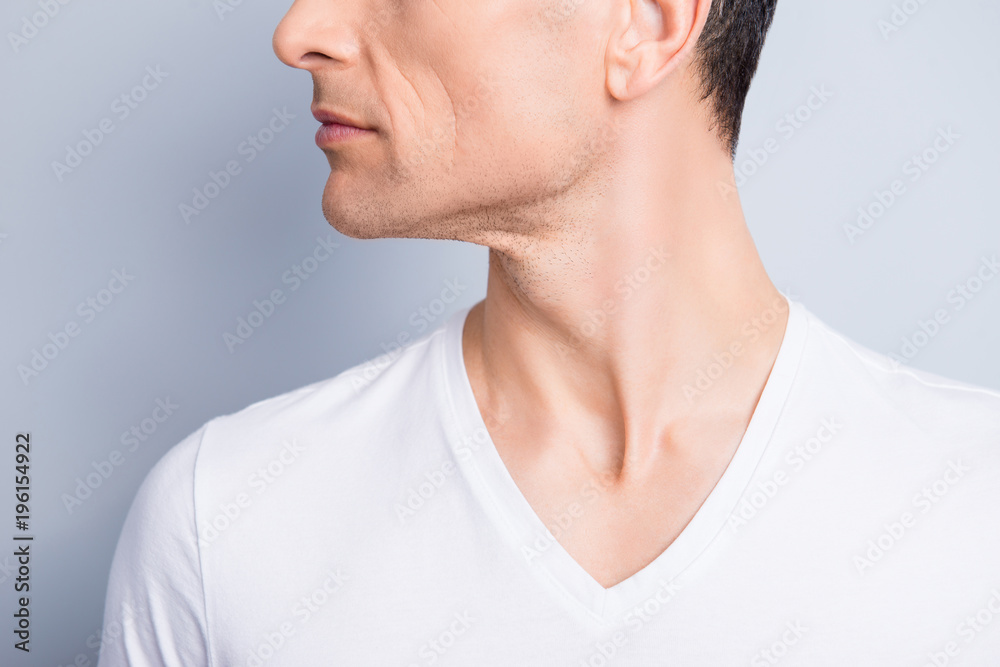 Cropped, close up profile, side view half face portrait of trendy, neat, experienced, stylish, brunet man with perfect oiled dry skin, isolated on grey background Cropped, close up profile, side view half face portrait of trendy, neat, experienced, stylish, brunet man with perfect oiled dry skin, isolated on grey background