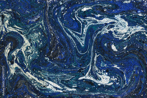 Creative abstract art background in blue and white colors. Handmade painted background. Acrylic painting on paper. Liquid paint.