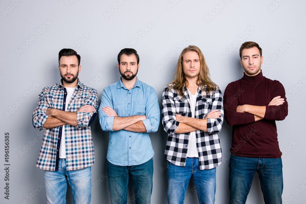 Obraz premium Harsh concentrated angry self-assured brutal macho strength success concept. Portrait of four calm peace man wearing checkered shirt turtleneck standing with crossed arms isolated on gray background