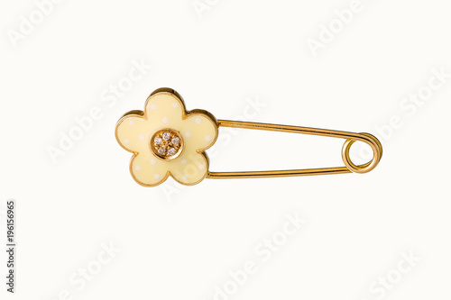 Beautiful Cute Baby & Kid safety Pin Brooch Jewelry with the safety pin design features a classic closure decorated throughout in yellow gold and diamond, birthday baby gift isolated on white