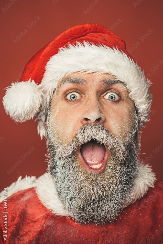 Waiting Christmas and New Year. New Year, Christmas and winter time - surprised bearded Santa Claus with frozen beard. Family holidays. Waiting Christmas and New Year. New Year, Christmas and winter time - surprised bearded Santa Claus with frozen beard. Family holidays.