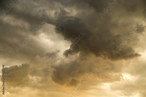 Photography Storm clouds in the sky at sunset as background