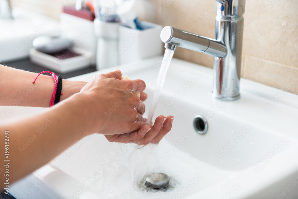 Beautiful young girl washing hands Beautiful young girl washing hands