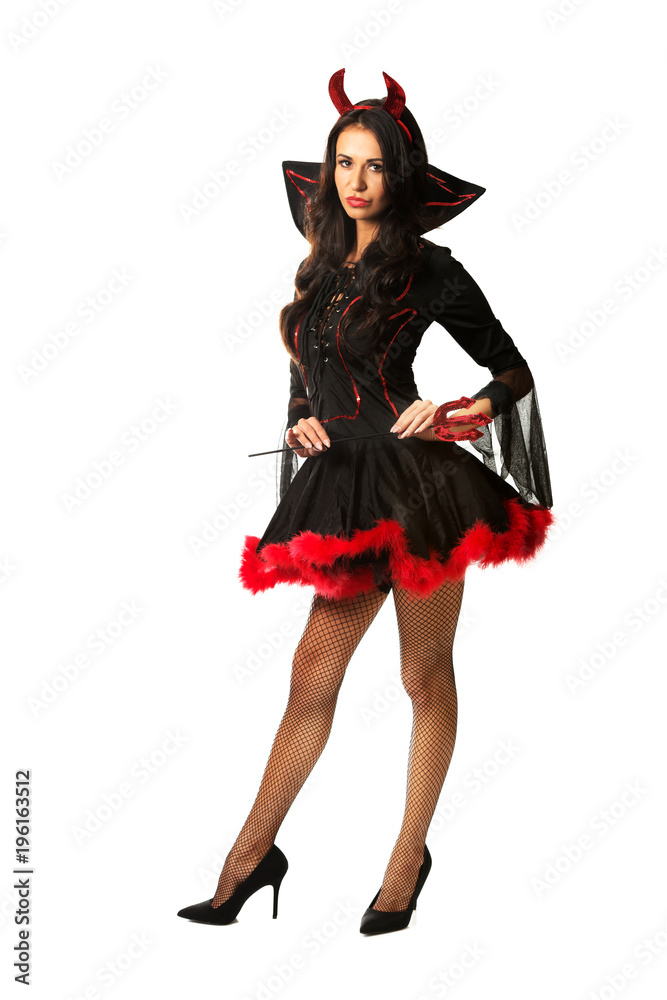 Woman wearing devil clothes holding trident Woman wearing devil clothes holding trident