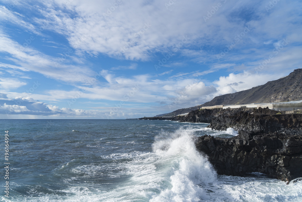 The volcanic rocks at the beach of El Remo near Puerto Naos at La Palma west coast / Canary Islands