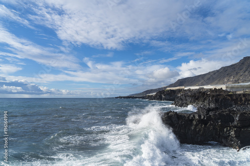 The volcanic rocks at the beach of El Remo near Puerto Naos at La Palma west coast / Canary Islands