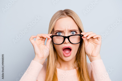 What  are you crazy mad  Nervous stress depression curious strange foxy people person concept. Close up portrait of amazed astonished wondered beautiful with big eyes isolated on gray background
