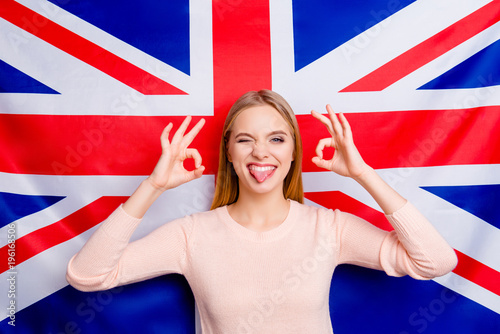 International background success tell talk chat teen age symbol union jack people person happiness concept. Portrait of excited cheerful delightful rejoicing linguist polyglot making ok with fingers