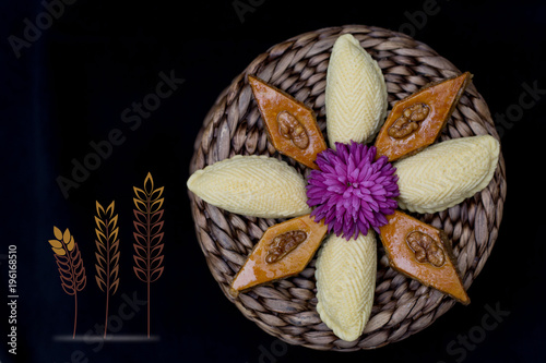 Novruz holiday pastry shekerbura and pakhlava as flower decoration 