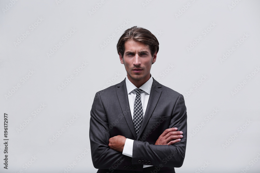 thoughtful businessman adjusting his tie. thoughtful businessman adjusting his tie.