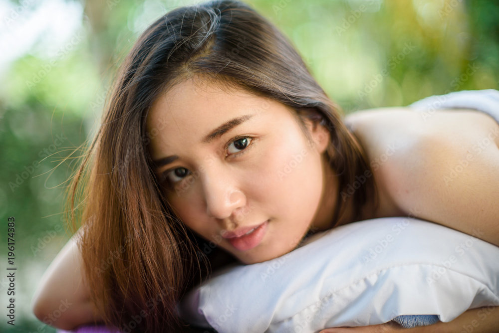 Young Asian woman feel relax after spa massage Young Asian woman feel relax after spa massage