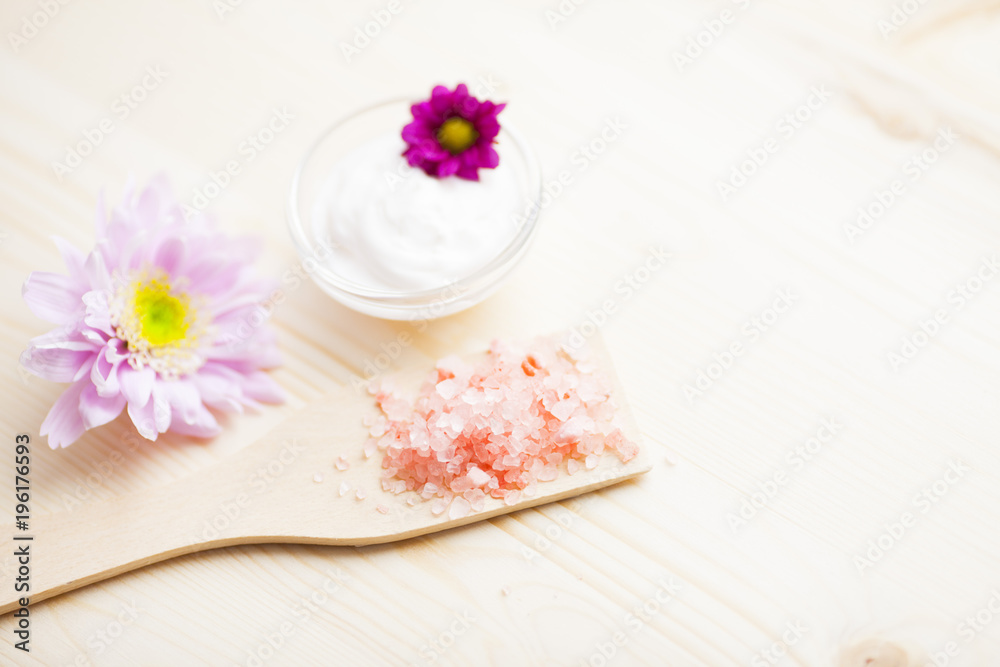 Spa and natural cosmetic concept. Composition of spa treatment for beauty and skincare on the wooden background. Top view. Close up.