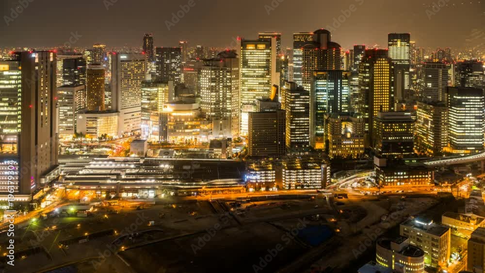 Osaka,Japan-Sep 4,2017: Timelapse of the stunning cityscape at night,Osaka, Japan Osaka,Japan-Sep 4,2017: Timelapse of the stunning cityscape at night,Osaka, Japan