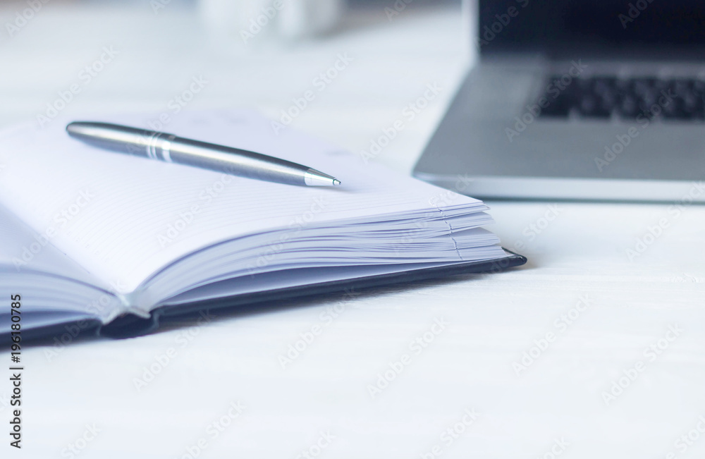 laptop and documents in the workplace. laptop and documents in the workplace.