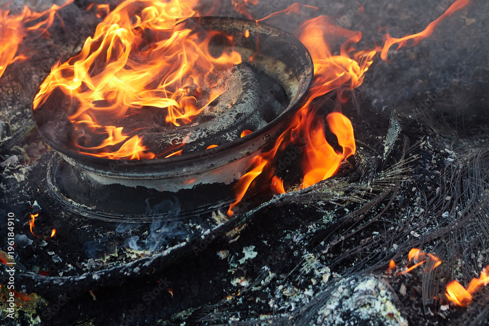 burnt car wheel, car accident, wheel in the fire, burnt tires, burning tires for protest burnt car wheel, car accident, wheel in the fire, burnt tires, burning tires for protest